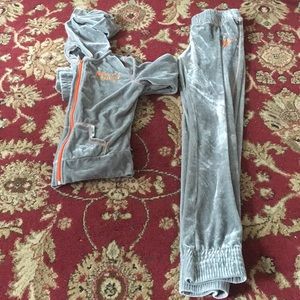 A Mecca Femme track suit